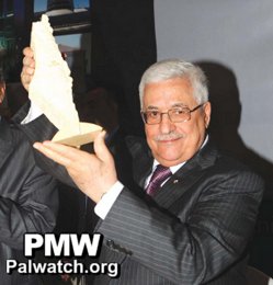 Abbas with a model of 'Palestine' covering all Israel